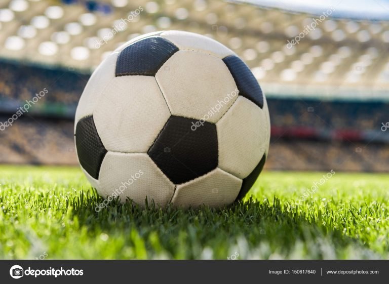 depositphotos_150617640-stock-photo-soccer-ball-on-grass